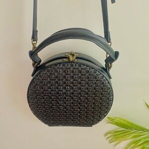 Anthropologie Woven Clamshell Circular Clutch